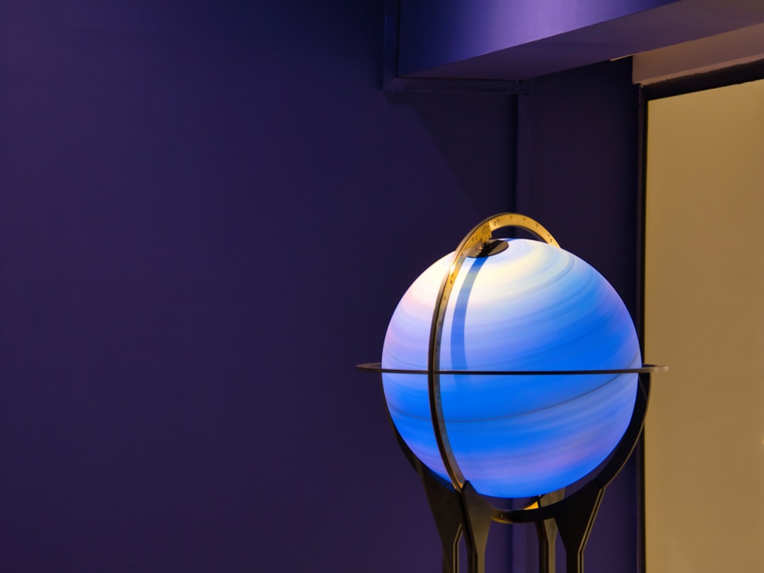 Photo Travertine Base Glass Globe Floor Lamp
