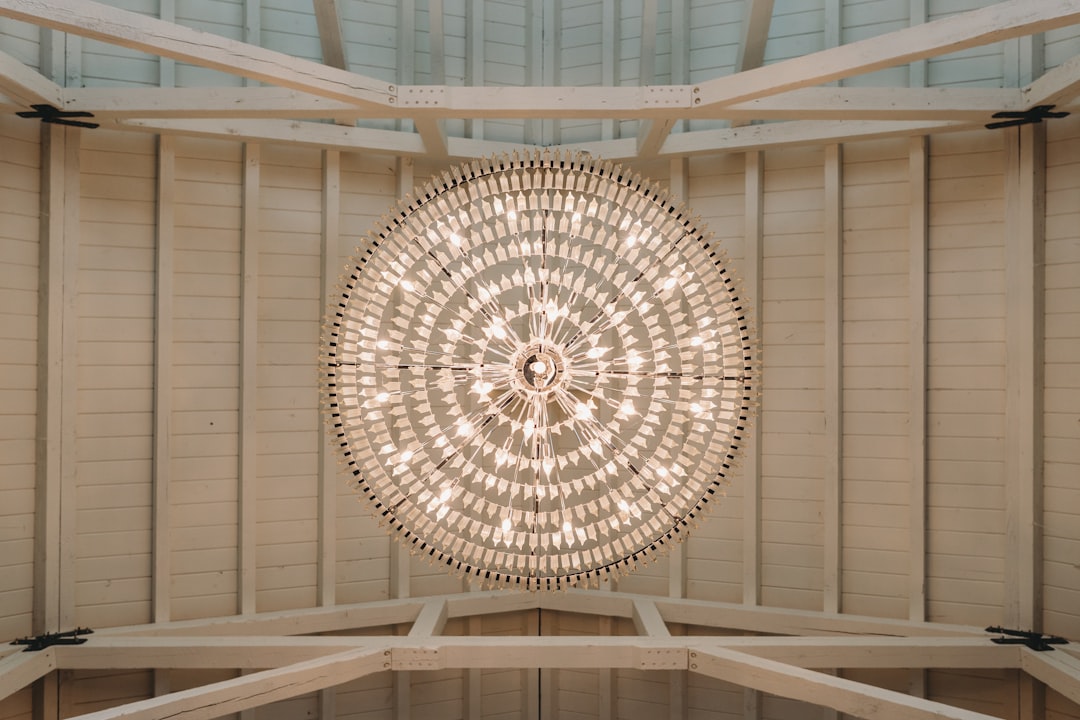 Photo wood bead chandelier